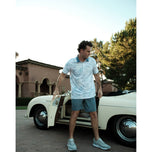 Travis Mathew 羽量级漂移高尔夫 Polo 衫 - 白色